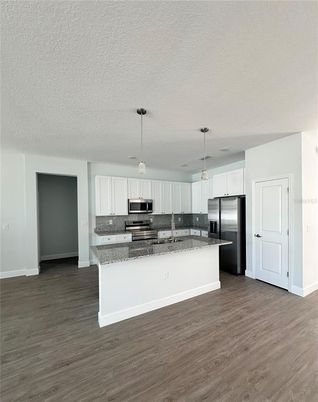 Interior, Kitchen, Pendant Lights, Stainless Steel Appliances, Wood Texture Flooring