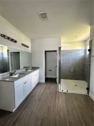 Bathroom, Dual Sink Vanities, Glass Shower, Interior, Wood Texture Flooring