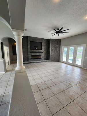 Empty room, Fireplace, Interior, Recessed Lighting, Stone Walls