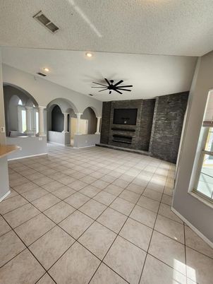 Empty room, Fireplace, Interior, Recessed Lighting, Stone Walls