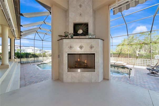Fireplace, Glass Ceilings, Interior, Pool, Sun Room