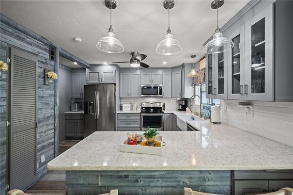Interior, Kitchen, Pendant Lights, Recessed Lighting, Stainless Steel Appliances, Wood Texture Flooring