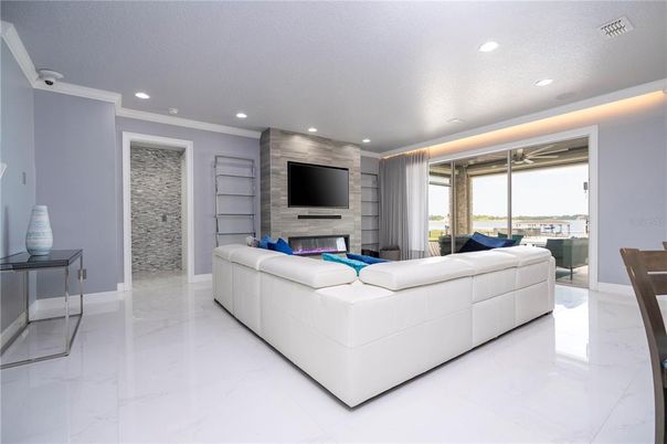 Fireplace, Interior, Living room, Marble, Recessed Lighting, Stone Walls