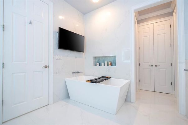 Bathroom, Fireplace, Free Standing Baths, Interior, Marble, Marble Walls, Recessed Lighting
