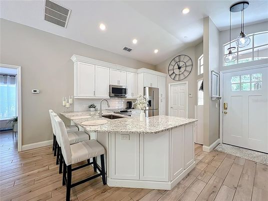Interior, Kitchen, Pendant Lights, Recessed Lighting, Stainless Steel Appliances, Wood Texture Flooring