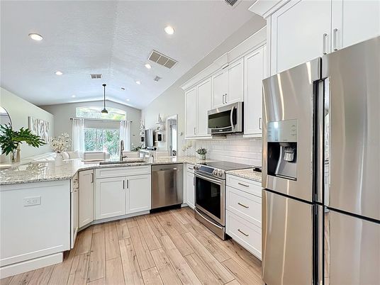 Interior, Kitchen, Pendant Lights, Recessed Lighting, Stainless Steel Appliances, Wood Texture Flooring