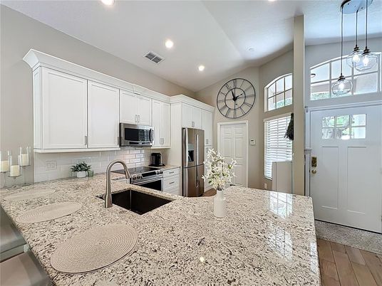 Interior, Kitchen, Pendant Lights, Recessed Lighting, Stainless Steel Appliances, Wood Texture Flooring