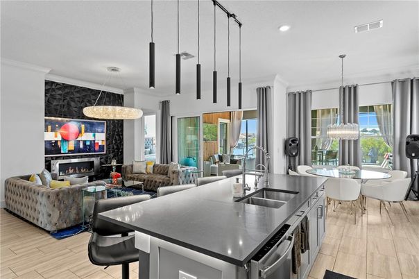 Dining room, Fireplace, Interior, Kitchen, Living room, Pendant Lights, Recessed Lighting, Stainless Steel Appliances, Wood Texture Flooring