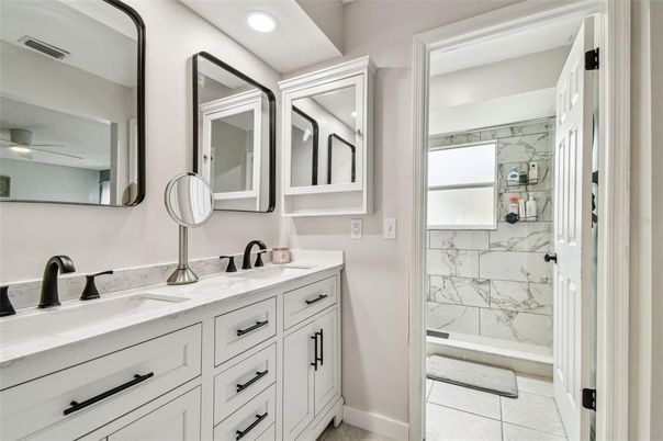 Bathroom, Dual Sink Vanities, Interior, Marble Walls, Recessed Lighting