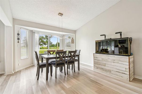 Dining room, Fireplace, Interior, Pendant Lights, Wood Texture Flooring