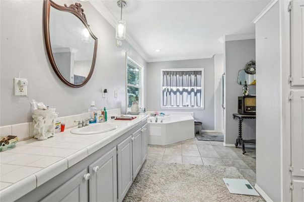 Bathroom, Dual Sink Vanities, Interior, Pendant Lights, Recessed Lighting, Tile Countertops