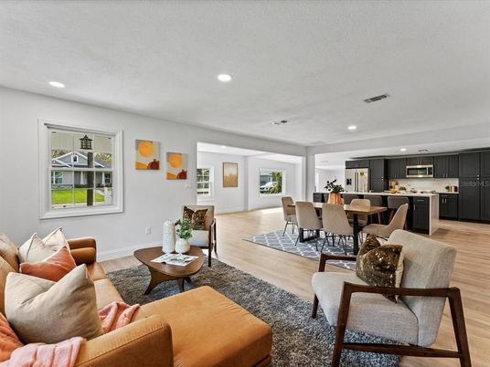 Dining room, Interior, Kitchen, Living room, Recessed Lighting, Stainless Steel Appliances, Wood Texture Flooring