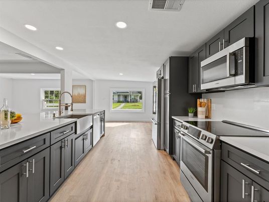Interior, Kitchen, Recessed Lighting, Stainless Steel Appliances, Wood Texture Flooring
