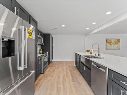 Interior, Kitchen, Recessed Lighting, Stainless Steel Appliances, Wood Texture Flooring