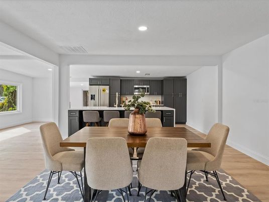 Dining room, Interior, Kitchen, Recessed Lighting, Stainless Steel Appliances, Wood Texture Flooring