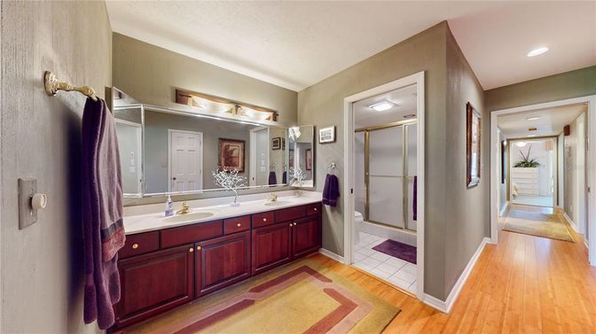 Bathroom, Dual Sink Vanities, Interior, Recessed Lighting, Wood Texture Flooring