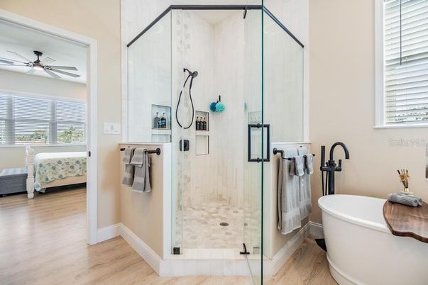 Bathroom, Free Standing Baths, Glass Shower, Interior, Wood Texture Flooring