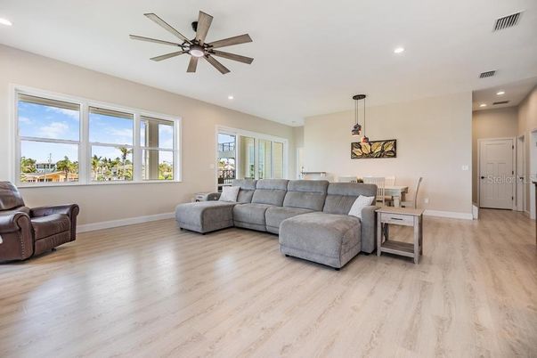 Dining room, Interior, Living room, Pendant Lights, Recessed Lighting, Wood Texture Flooring