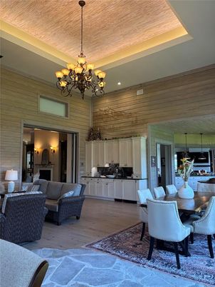 Chandelier, Dining room, Interior, Living room, Recessed Lighting, Wooden Ceilings, Wood Texture Flooring, Wooden Walls