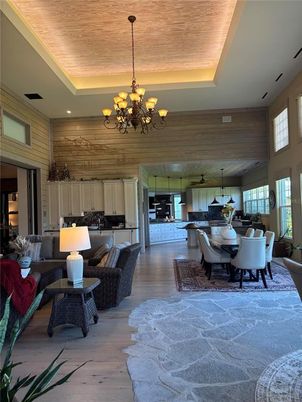 Chandelier, Dining room, Interior, Kitchen, Living room, Pendant Lights, Recessed Lighting, Wooden Ceilings, Wood Texture Flooring