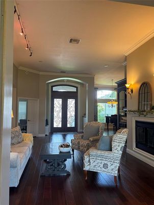 Chandelier, Dining room, Fireplace, Interior, Living room, Pendant Lights, Wood Texture Flooring