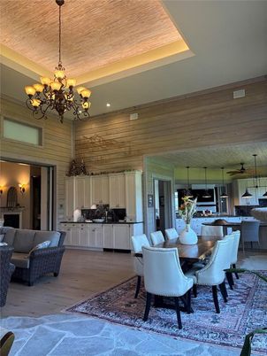Chandelier, Dining room, Interior, Kitchen, Living room, Recessed Lighting, Wooden Ceilings, Wood Texture Flooring, Wooden Walls