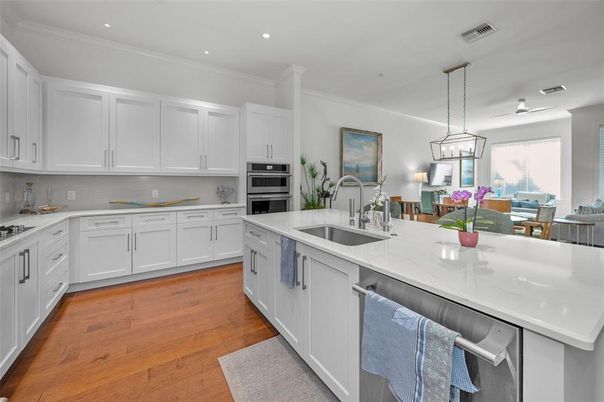 Dining room, Interior, Kitchen, Pendant Lights, Recessed Lighting, Stainless Steel Appliances, Wood Texture Flooring