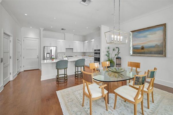 Dining room, Interior, Kitchen, Pendant Lights, Recessed Lighting, Stainless Steel Appliances, Wood Texture Flooring