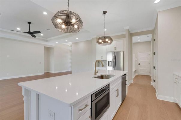 Interior, Kitchen, Pendant Lights, Recessed Lighting, Stainless Steel Appliances, Wood Texture Flooring