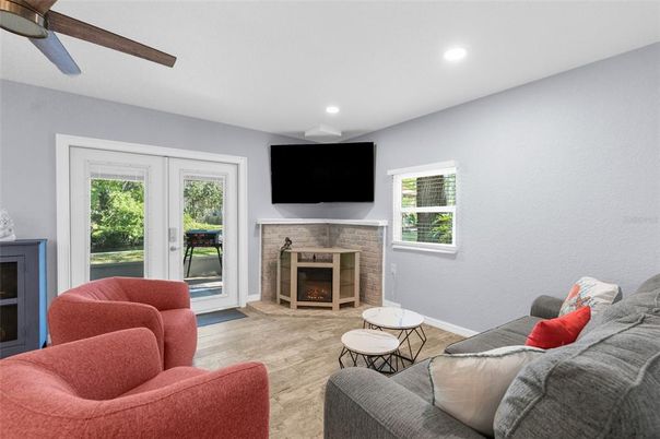 Fireplace, Interior, Living room, Recessed Lighting, Wood Texture Flooring