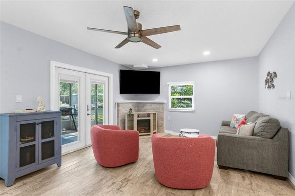 Fireplace, Interior, Living room, Recessed Lighting, Wood Texture Flooring