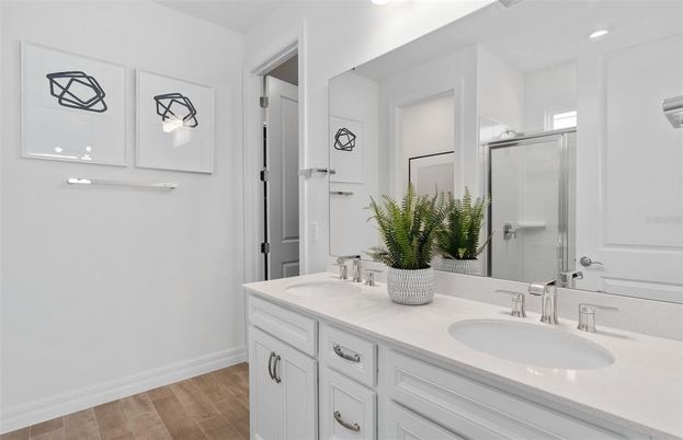 Bathroom, Dual Sink Vanities, Glass Shower, Interior, Recessed Lighting, Wood Texture Flooring