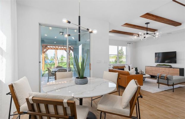 Dining room, Interior, Living room, Pendant Lights, Recessed Lighting, Wooden Beams, Wood Texture Flooring
