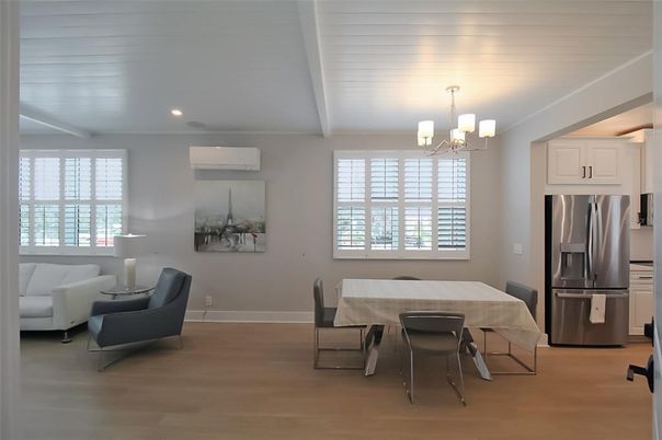 Chandelier, Dining room, Interior, Kitchen, Living room, Recessed Lighting, Stainless Steel Appliances, Wood Texture Flooring