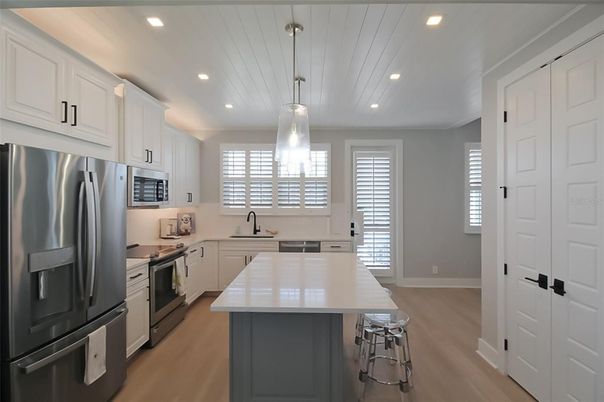 Interior, Kitchen, Pendant Lights, Recessed Lighting, Stainless Steel Appliances, Wood Texture Flooring