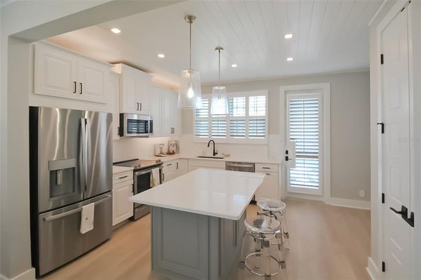 Interior, Kitchen, Pendant Lights, Recessed Lighting, Stainless Steel Appliances, Wood Texture Flooring