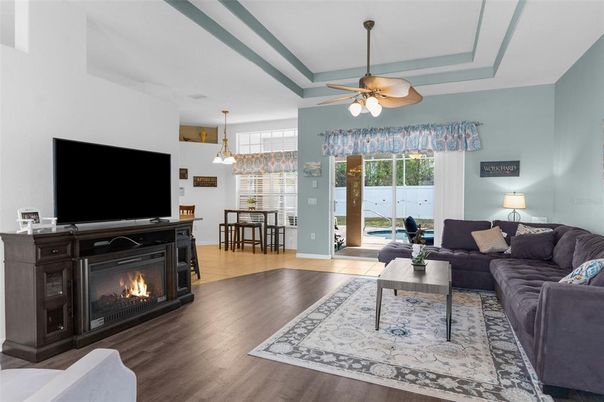 Dining room, Fireplace, Interior, Living room, Pendant Lights, Wood Texture Flooring