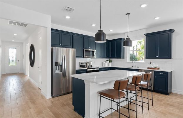 Interior, Kitchen, Pendant Lights, Recessed Lighting, Stainless Steel Appliances, Wood Texture Flooring