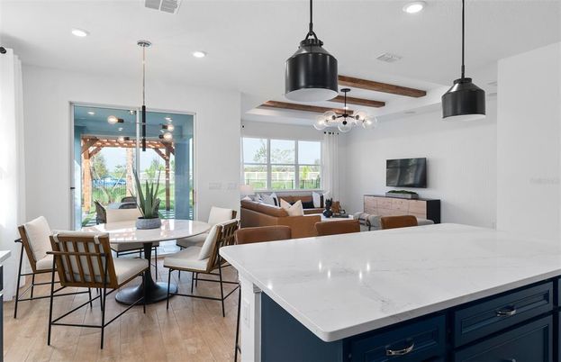 Dining room, Interior, Living room, Pendant Lights, Recessed Lighting, Wooden Beams, Wood Texture Flooring