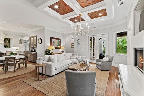 Dining room, Fireplace, Interior, Kitchen, Living room, Pendant Lights, Recessed Lighting, Stainless Steel Appliances, Wooden Ceilings, Wood Texture Flooring