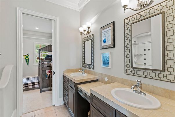 Bathroom, Dual Sink Vanities, Interior, Recessed Lighting, Tile Countertops