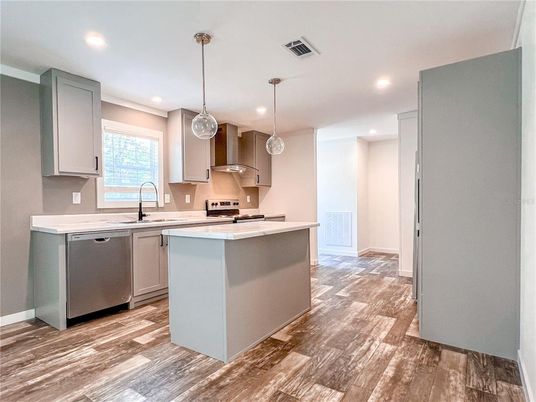 Interior, Kitchen, Pendant Lights, Recessed Lighting, Stainless Steel Appliances, Wood Texture Flooring