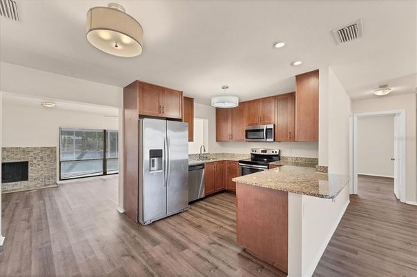 Interior, Kitchen, Recessed Lighting, Stainless Steel Appliances, Wood Texture Flooring