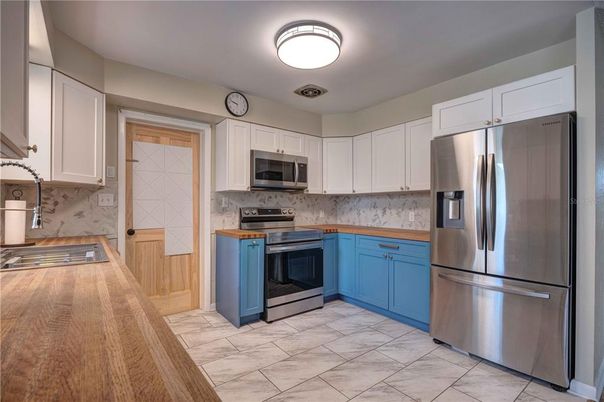 Interior, Kitchen, Marble Walls, Stainless Steel Appliances