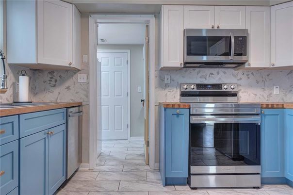 Interior, Kitchen, Marble, Marble Walls, Stainless Steel Appliances