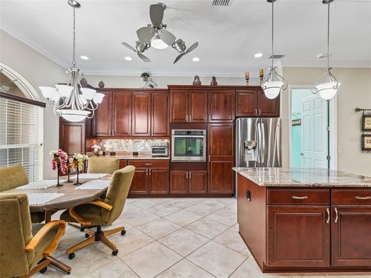 Chandelier, Dining room, Interior, Kitchen, Pendant Lights, Recessed Lighting, Stainless Steel Appliances