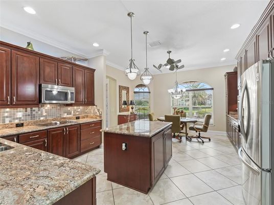 Chandelier, Dining room, Interior, Kitchen, Pendant Lights, Recessed Lighting, Stainless Steel Appliances