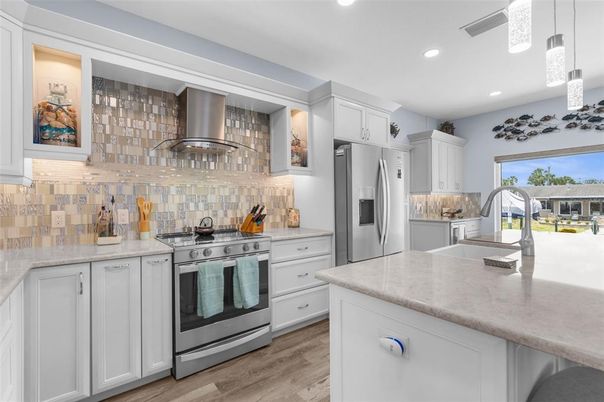 Interior, Kitchen, Pendant Lights, Recessed Lighting, Stainless Steel Appliances, Wood Texture Flooring