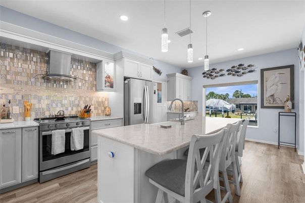 Interior, Kitchen, Pendant Lights, Recessed Lighting, Stainless Steel Appliances, Wood Texture Flooring