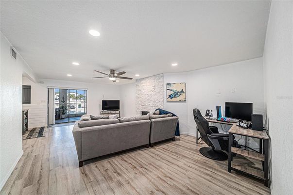Interior, Living room, Recessed Lighting, Stone Walls, Wood Texture Flooring